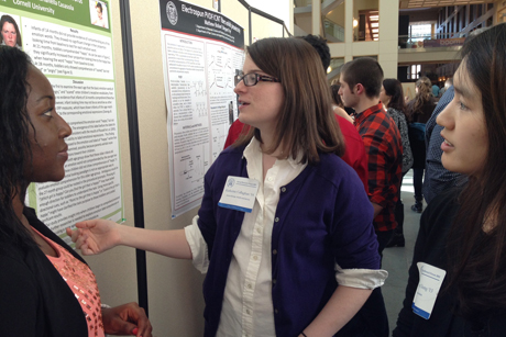 Gloria Appiah-Kubi ’13 (from left), talks with Katherine Callaghan ’14 and Hyun Jung Chung ’13 at the Cornell Undergraduate Research Forum.