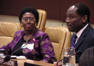 N'Dri Assie-Lumumba, left, who organized the UN trip, chats with Abiodun Williams
