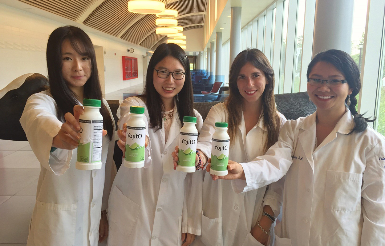 food science team holds bottles of Yojito