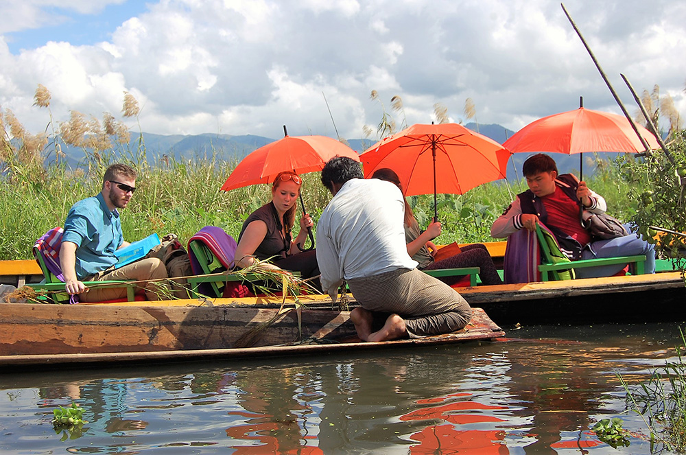 Exploring the floating gardens at Inle Lake by boat.