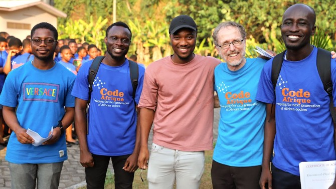 Cornelius Boateng (left), Cynoc Boahene (center) and Robbert van Renesse (second from right) with two teachers from Prempeh College.