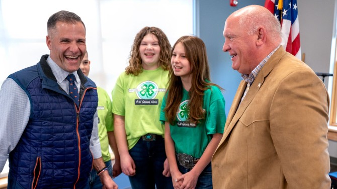 Marc Molinaro and G.T. Thompson with 4-H members