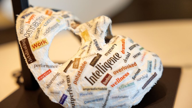 Ashlee Cherry, class programs event manager in Alumni Affairs and Development, submitted a plaster mask of her face that she covered with words from magazines, to represent the difficulty of masking the symptoms of her neurodiversity and chronic illness.