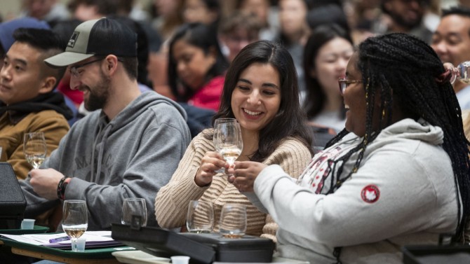 Students sample wine in class.