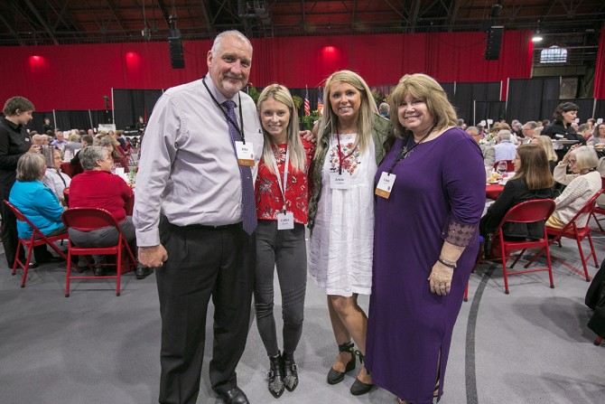 John Durbin (far left) and Cindy Durbin (far right) both celebrate 35 years of service with their daughters Caitlyn Durbin and Jenna Graham.