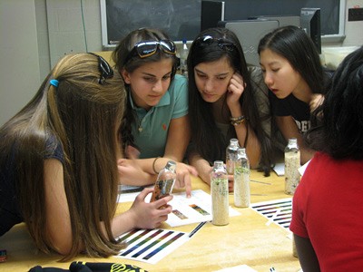 Visiting seventh-graders from Manhattan compare notes in the fundamentals of spectroscopy