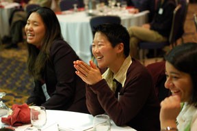 Joana Kim '04; In Young Paik, a graduate student; and Tania Khanna '05 enjoy a moment during the Mosaic conference. 