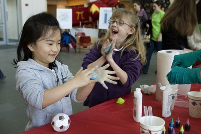 Kacey Painter, 8, right, and her friend Min Jung Kim, 7, both of Vestal, have fun making their own silly putty out of glue