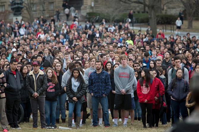 More than a thousand people gather on the Arts Quad to remember President Garrett