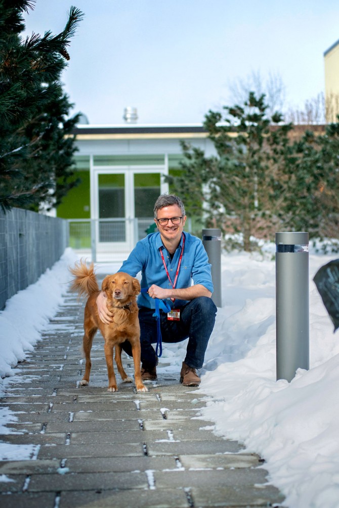 Dr. Jan Krumsiek with Noma, a canine biobank donor