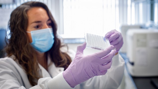 Researcher looks at Cover test samples