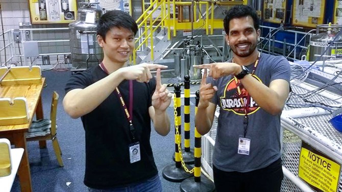 Doctoral students Phillip Dang (left) and Reet Chaudhuri at the National High Magnetic Field Laboratory