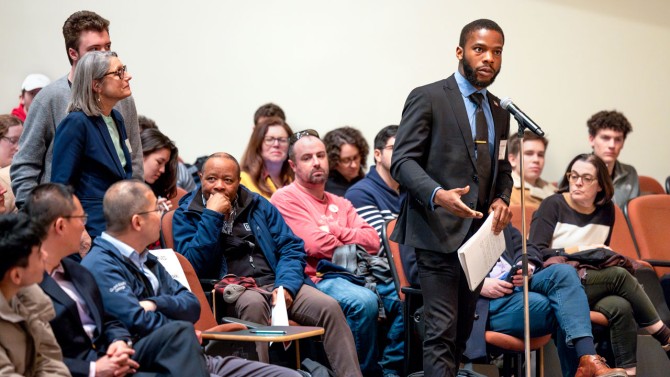 An audience member asks a question during the Q&A portion of the Durland Memorial Lecture.