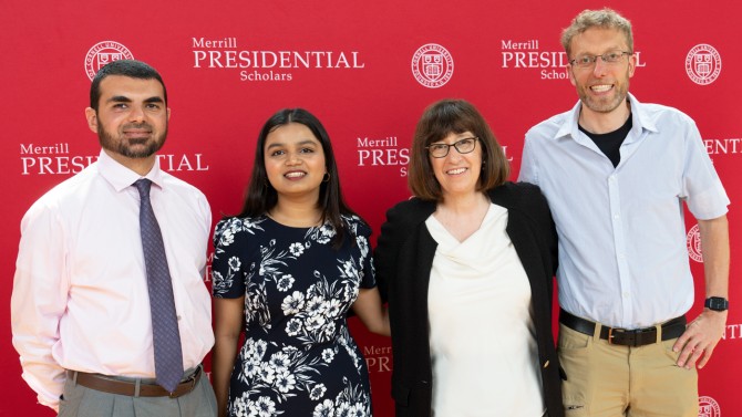 Cornell President Martha E. Pollack, second from right, stands with with Sahar Sami ’23, second from left, and her mentors Amro Mosaad, left, and professor Kilian Weinberger at the Merrill Scholars ceremony.