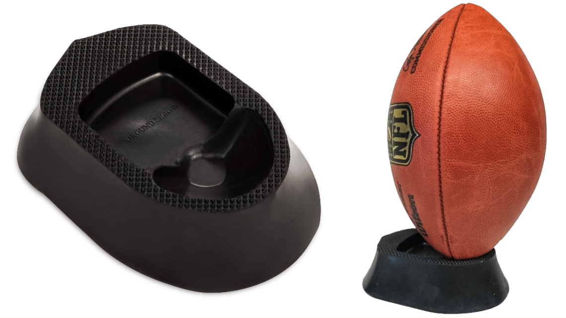 a football tee is seen on the left, a second tee on the right with a football placed on it