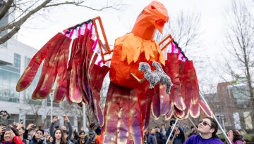 The phoenix in front of the Engineering Quad awaits the dragon. 
