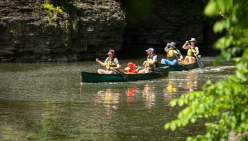 Reunion attendees canoeing on Beebe Lake. 