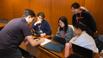 Students draft ideas at Cornell’s inaugural Legal Information Institute Hackathon in Myron Taylor Hall.
