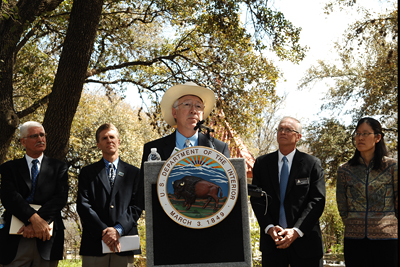 Secretary of the Interior Ken Salazar, center, discusses the  2010 State of the Birds Report on Climate Change in Austin, Texas, as, from left, Glenn Olsen, Paul Schmidt, John Hoskins and Miyoko Chu look on.