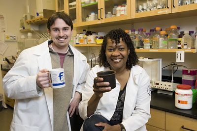 researchers with coffee mugs