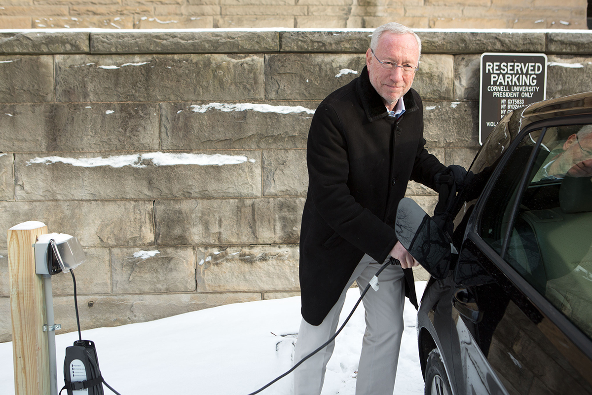 Michael Kotlikoff with electric car