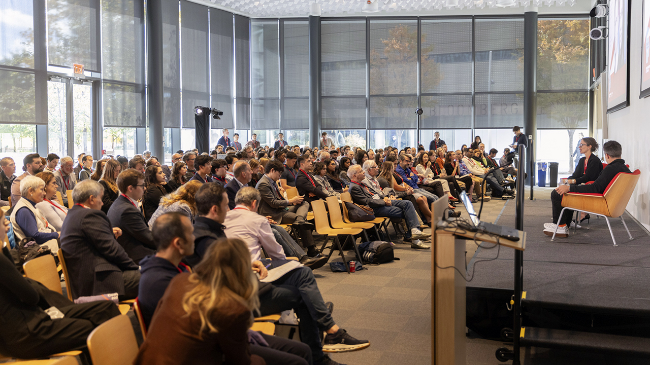 Eclectic Convergence attendees at Cornell Tech listen to a conversation between Lauren Wolfe ’00, left, co-founder and partner, Impactive Capital, and her husband Josh Wolfe ’99, partner and co-founder, Lux Capital.