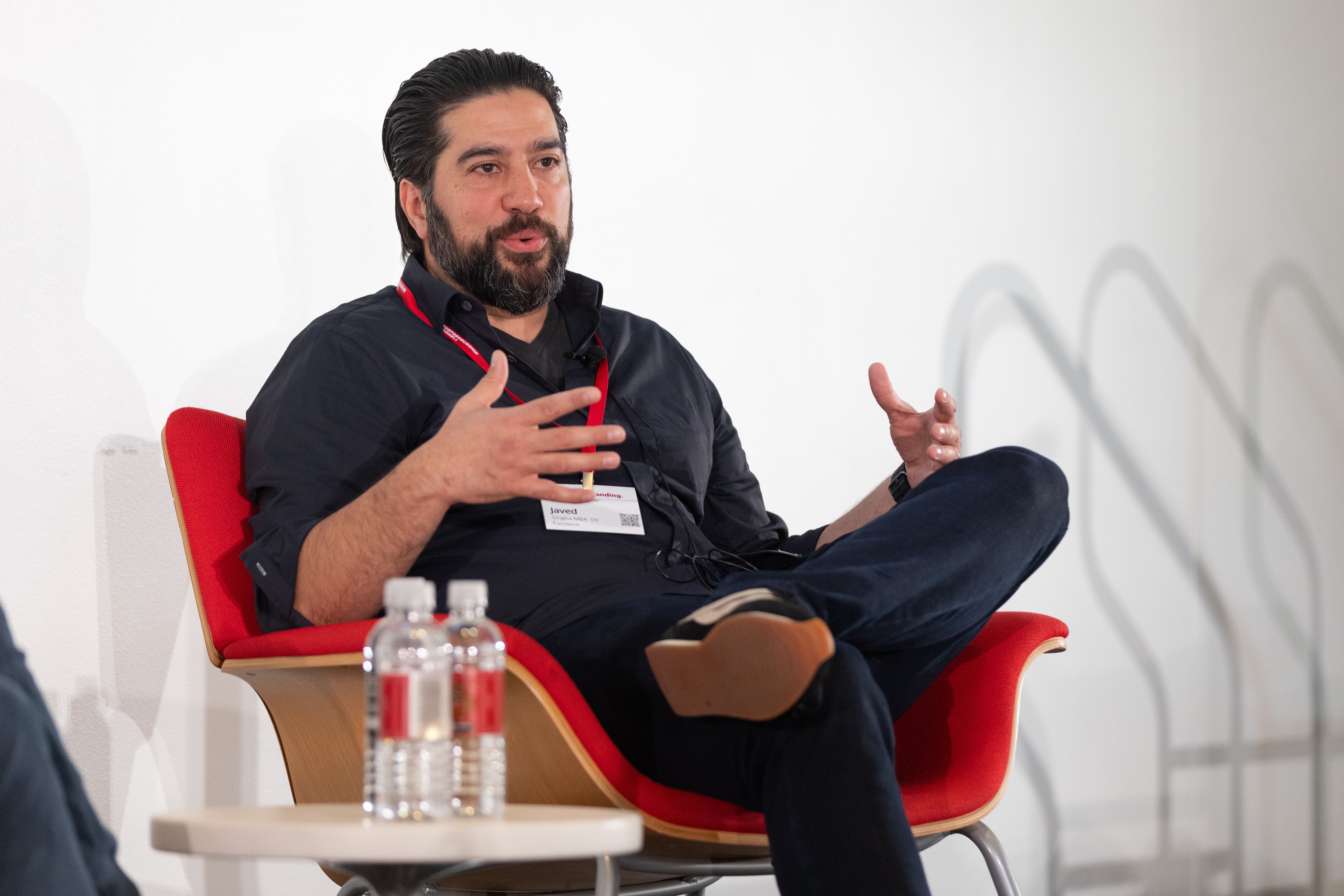 person sitting and speaking 