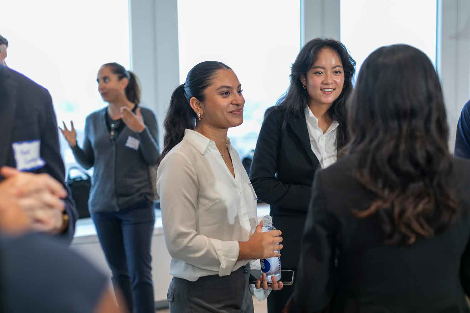 people talking at an event in new York City