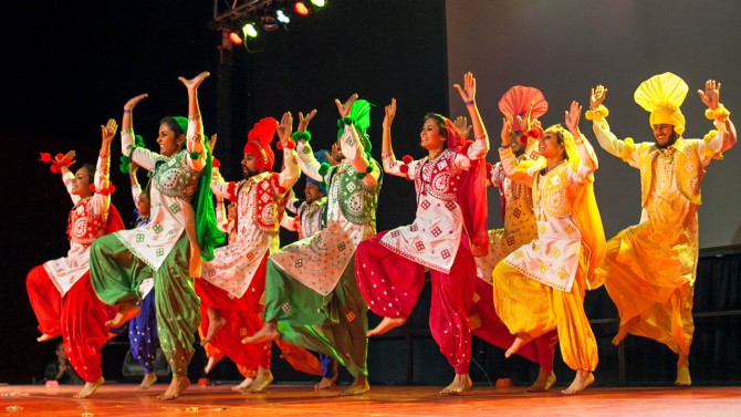 The 2013 Cornell Bhangra team performs in vardi, the traditional Punjabi dress, at the 12th annual PAO Bhangra.