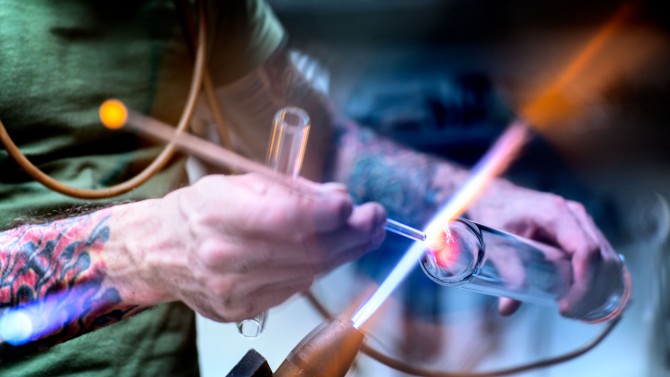 Karl Termini works with glass heated to 4,500 degrees Fahrenheit