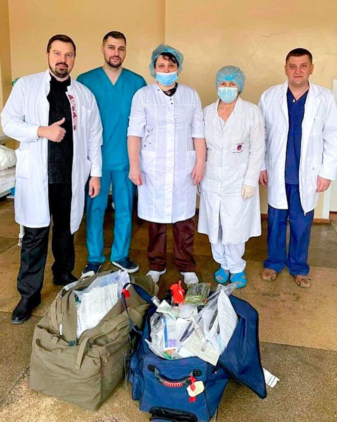 Health care workers in Cherkasy with some of the successfully delivered medical supplies. 