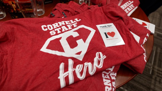 Shirts and gifts are displayed during a Cornell Heroes lunch to recognize Cornell staff members on May 10.