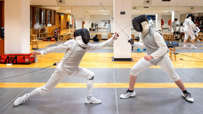 Students from the Men's Fencing Club, which clinched a surprise win at the U.S. Association of Collegiate Fencing Clubs championships, spar at a practice on May 1.