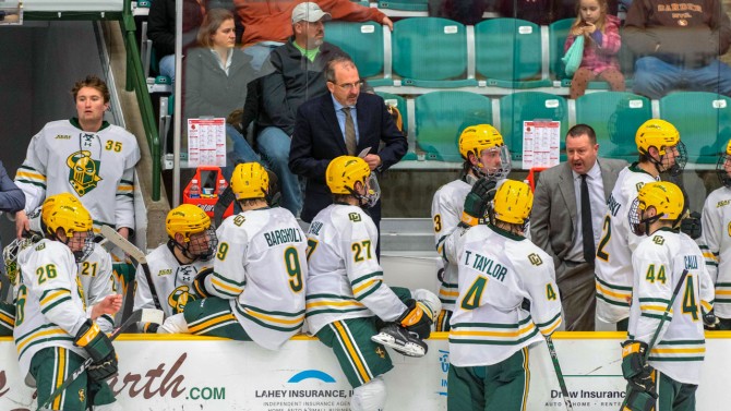 Casey Jones coaches from the Clarkson bench during a 2022-23 men’s ice hockey game against Cornell.