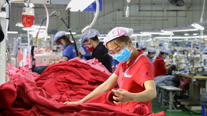 Woman sewing in Vietnam