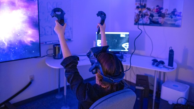 A Cornell student takes a trip through space in Anderson’s “To The Moon” virtual reality experience, which is on campus through Oct. 6 at the Center for Teaching Innovation.