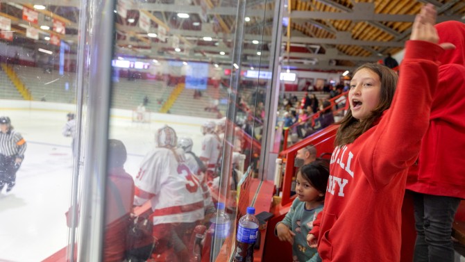 The community cheers on the Big Red women’s hockey team to cap off the annual Employee Celebration.