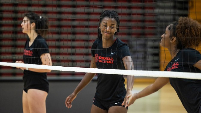 Volleyball player Sydney Moore, center, at a team practice.