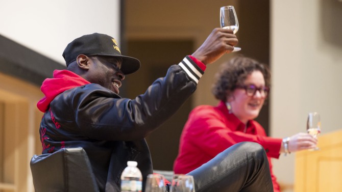 Senior lecturer Cheryl Stanley ’00, right, leads the class along with guest lecturer Jermaine Stone, host of the Wine and Hip-Hop podcast, the TV series Street Somm and owner of Cru Luv Selections.
