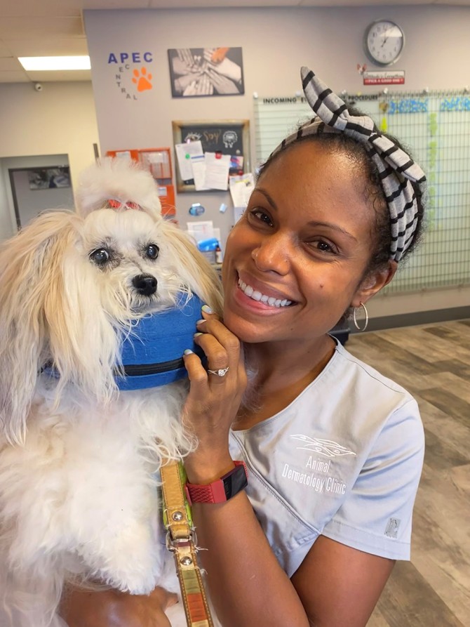 Joya Griffin, D.V.M. ’06, with a patient.