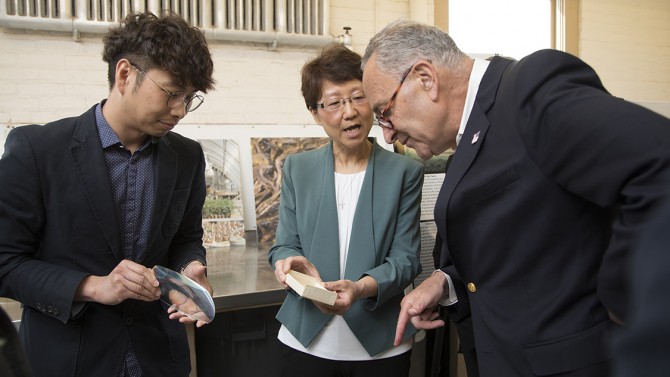 Senator Chuck Schumer chats with Jaebum Park and Xiaohong Wang during visit