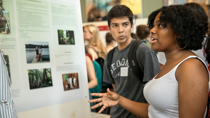 Kierra Grayson speaks with fellow students at the Cornell Commitment