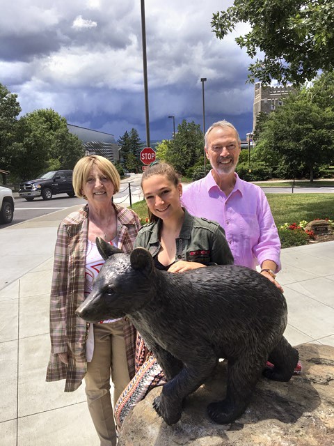 Bob Eberly Jr. ’66 with his wife, Kathy, and their granddaughter, Hayden Garniewicz, on a campus