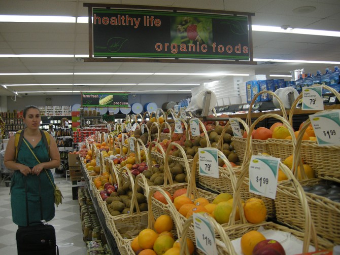 Elaine Hill conducts research at an independent grocery store