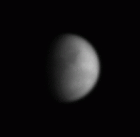 Titan's surface as the moon executes nearly one complete rotation