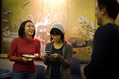 Lily Lin '10, left, shares a laugh with Hyangmi Kwak '13, center, and Liang Xiang '11 in Rockefeller Hall