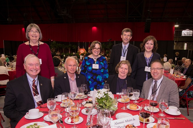 Staff members from Alumni Affairs and Development and guests celebrate at the 63rd Service Recognition Dinner June 5.