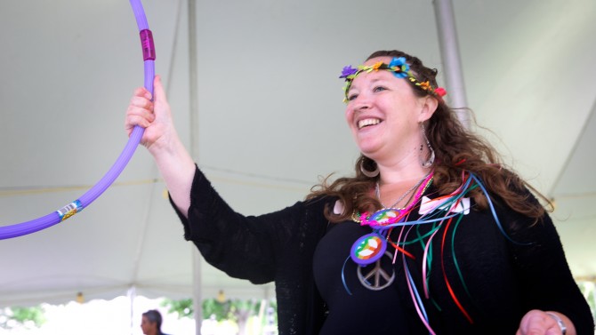 Jolene Layton epitomizes the '60s theme of this year’s Arts and Sciences picnic.