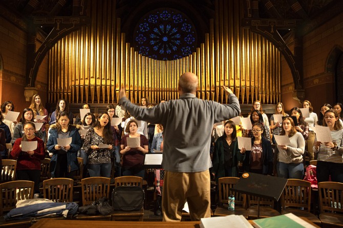 Members of the Cornell University Chorus sing during rehearsal 