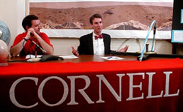 Jim Bell (left) and Bill Nye describes the sundail